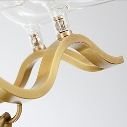 Lámpara de araña de metal moderna y contemporánea de latón para diseñadores.