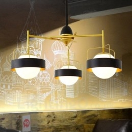 Lámpara de techo moderna contemporánea de 3 luces con baño de cobre y pantalla de cristal esférico blanco y negro.