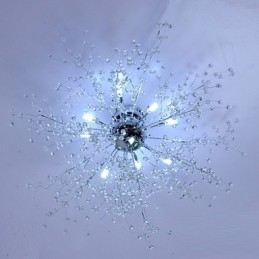 Lámpara de araña moderna de metal cromado con forma de globo de cristal