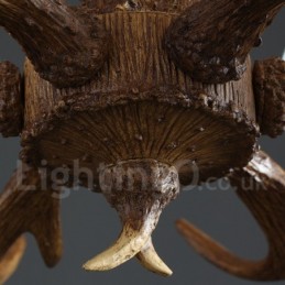 Lámpara colgante de araña de resina de estilo industrial para tienda.