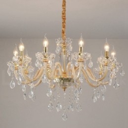 Candelabro dorado con candelabro de cristal transparente