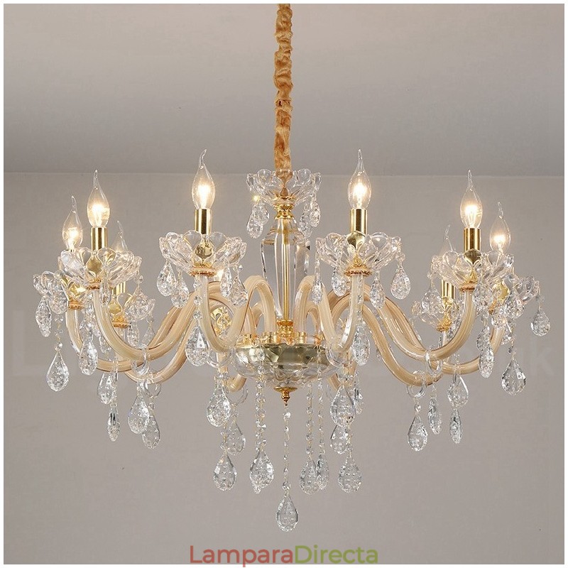 Candelabro dorado con candelabro de cristal transparente