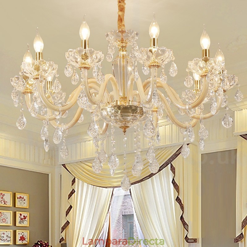 Candelabro dorado con candelabro de cristal transparente