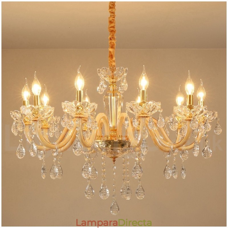 Candelabro dorado con candelabro de cristal transparente