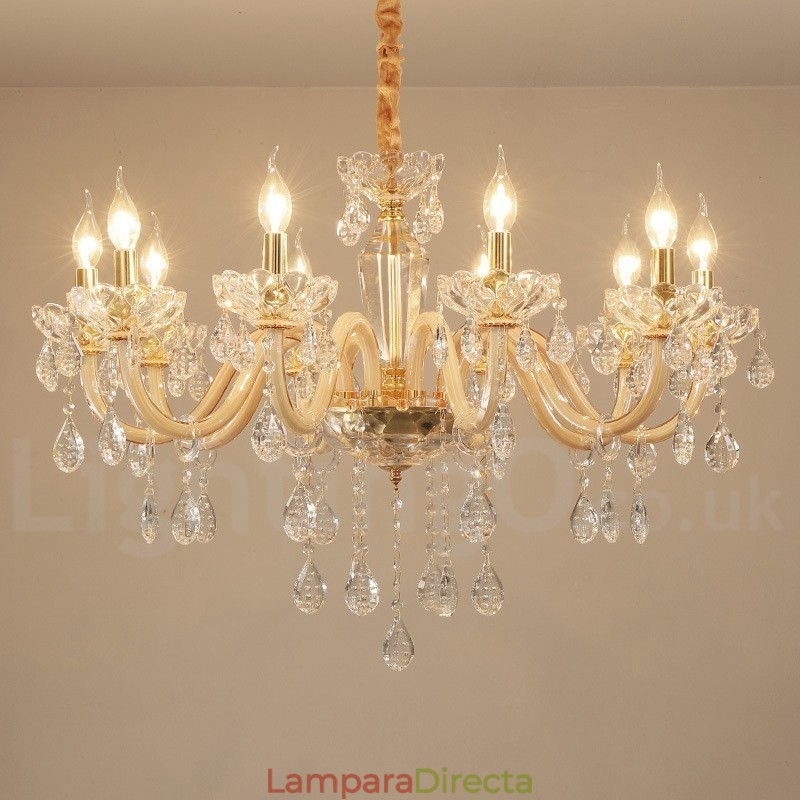 Candelabro dorado con candelabro de cristal transparente