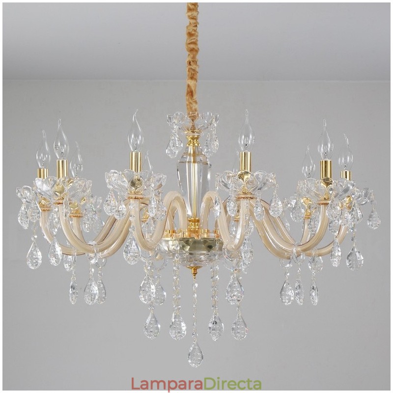 Candelabro dorado con candelabro de cristal transparente