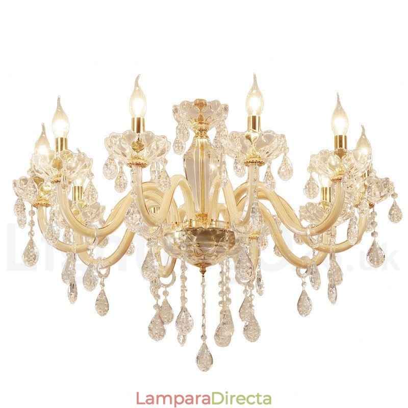 Candelabro dorado con candelabro de cristal transparente