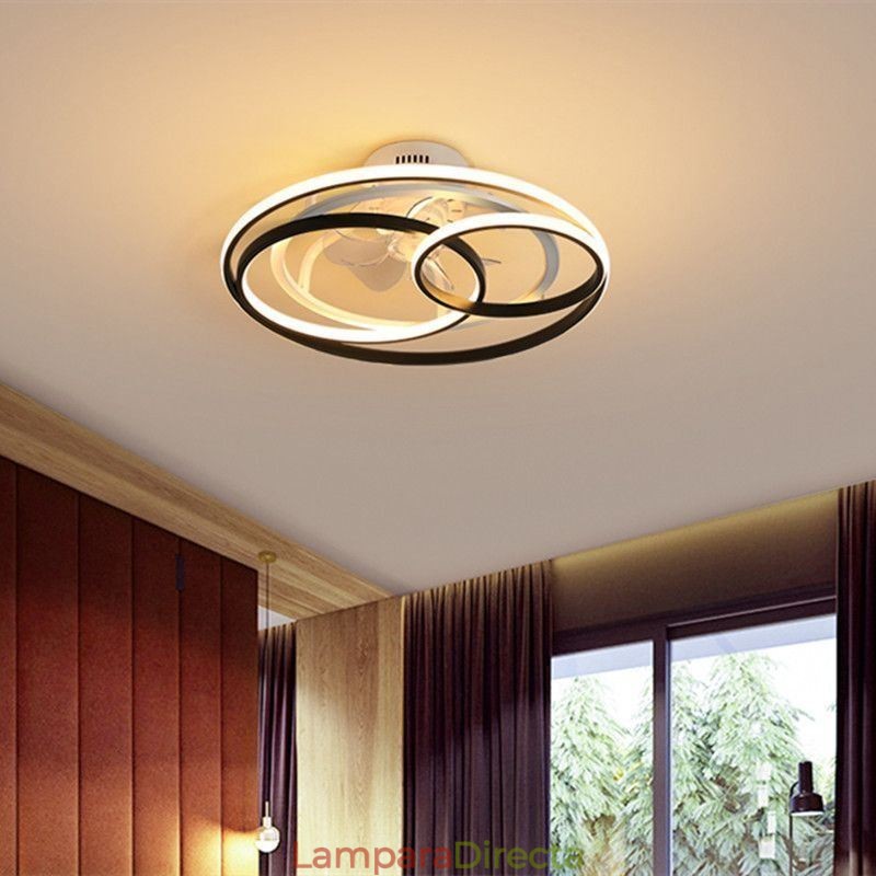 Lámparas de techo modernas con anillos circulares y ventilador de techo de diseño.