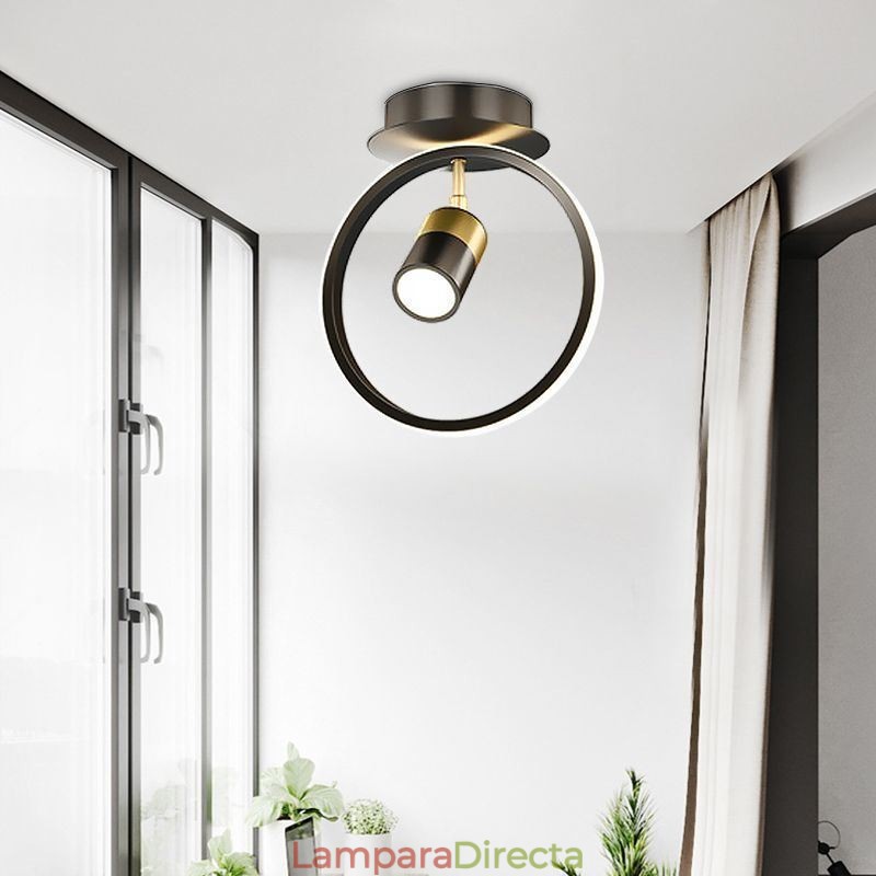 Lámpara de techo acrílica minimalista con foco decorativo.