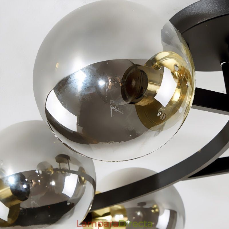 Lámpara de techo moderna minimalista con forma de rama y globo de cristal