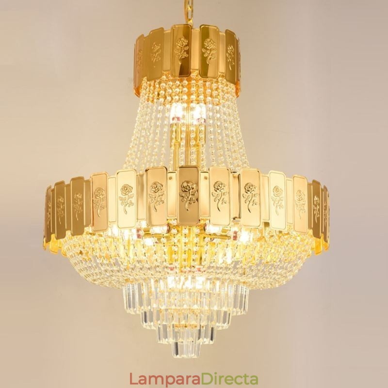 Lámpara colgante de cristal dorado, elegante y decorativa.