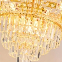 Lámpara colgante de cristal dorado, elegante y decorativa.