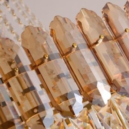 Lámpara colgante moderna de cristal dorado