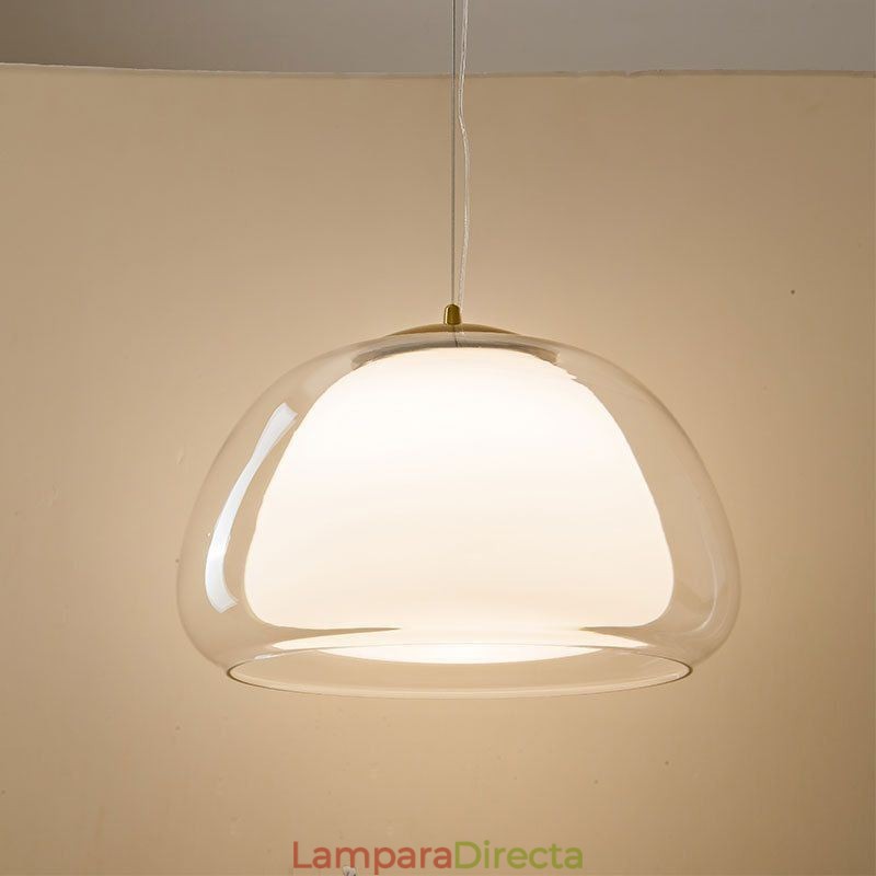 Lámpara colgante moderna y sencilla de cristal transparente con forma de pudín.