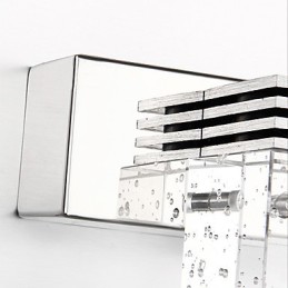 Lámpara de pared moderna con pantalla cúbica de burbujas de vidrio y espejo frontal.