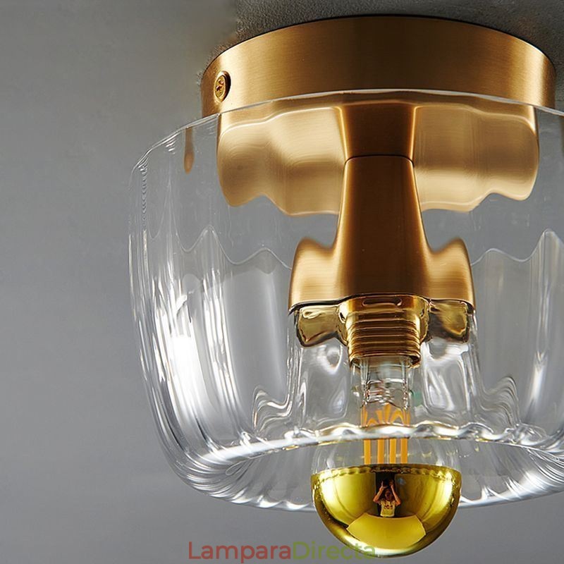 Iluminación de pared moderna con pantalla de vidrio transparente, aplique de pared cepillado.