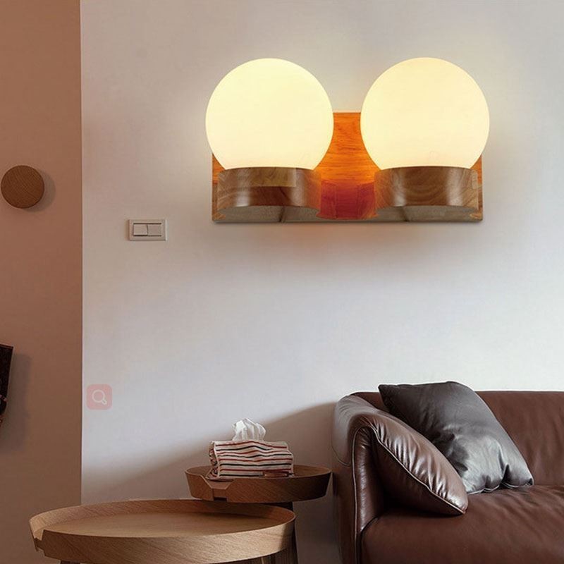 Lámpara de pared nórdica de madera maciza con forma de bola acogedora