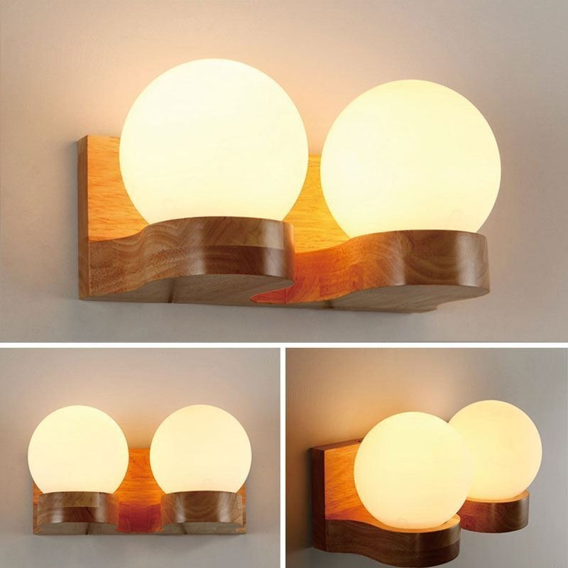 Lámpara de pared nórdica de madera maciza con forma de bola acogedora