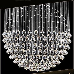 Lámpara colgante moderna de cristal de 12 luces con dosel plateado y globo de cristal transparente.