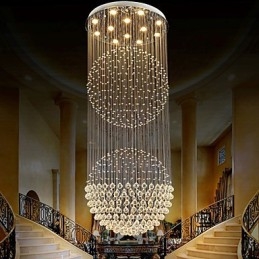 Lámpara colgante moderna de cristal de 12 luces con dosel plateado y globo de cristal transparente.